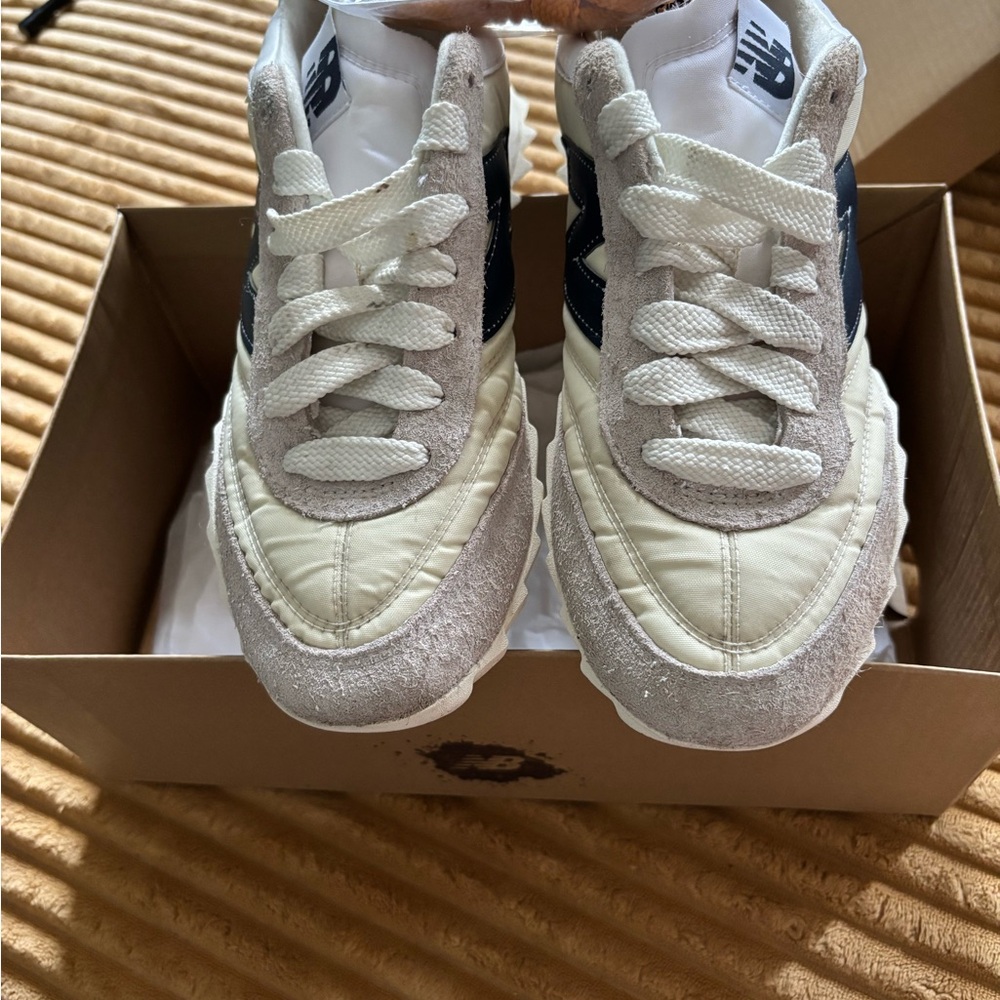 New Balance Cream and Black Sneakers